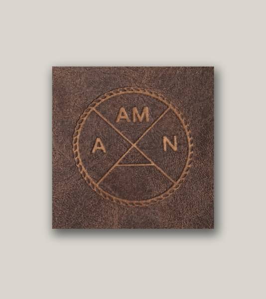 Custom leather pouch with engraved design
